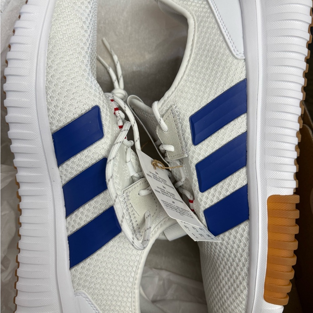 Adidas White Mesh Sneakers with Blue Stripes